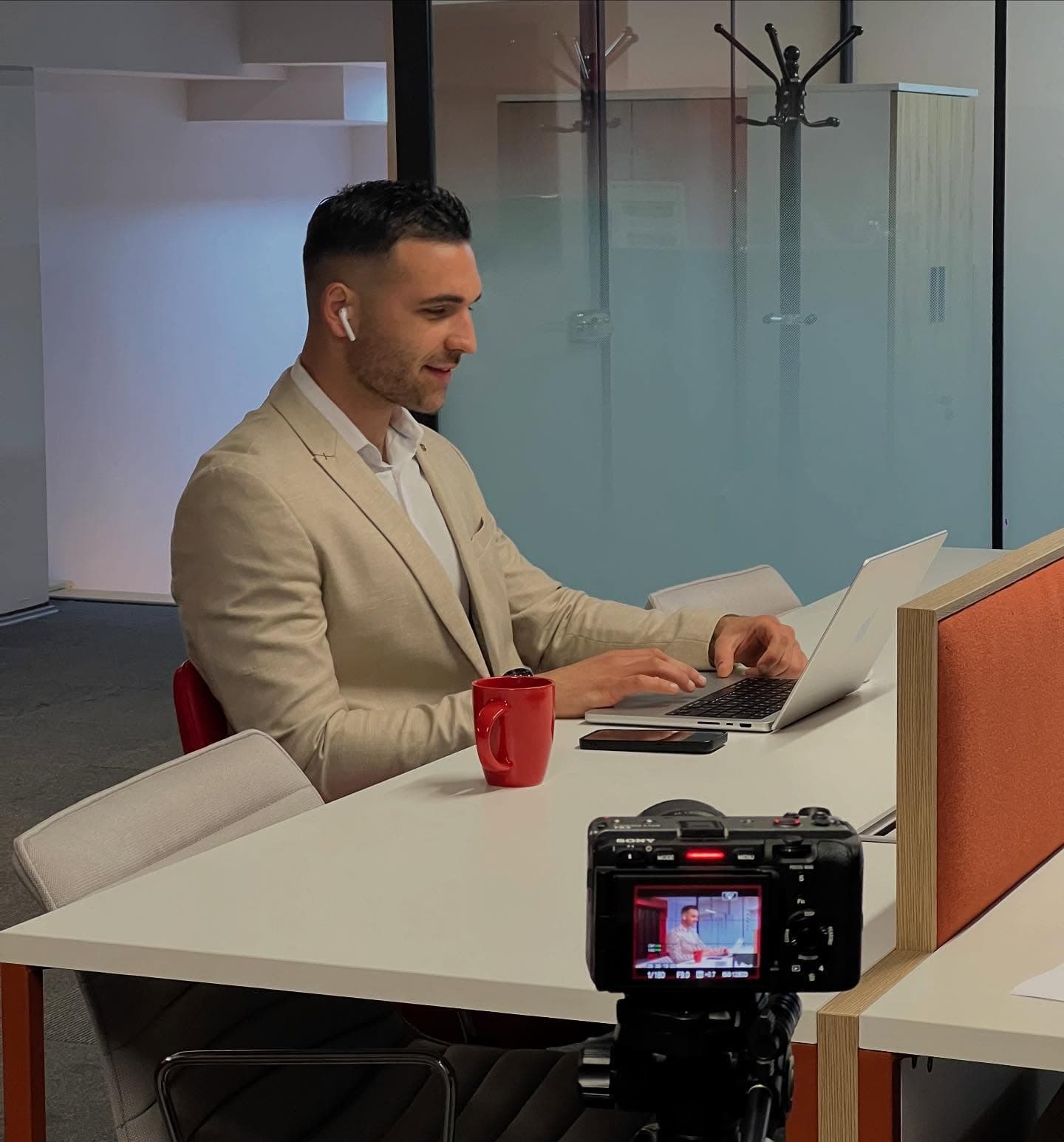 Trinity Shield founder working at a desk